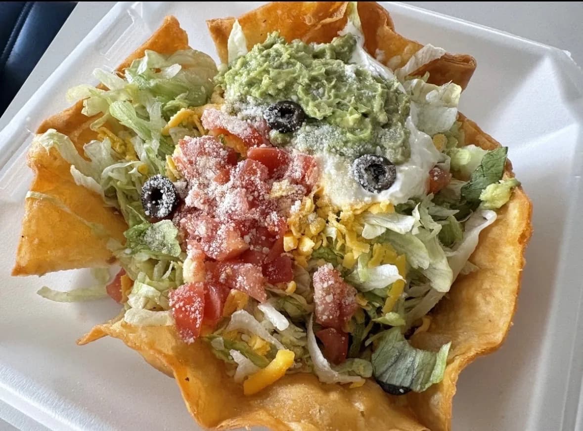A colorful taco salad that looks delicious